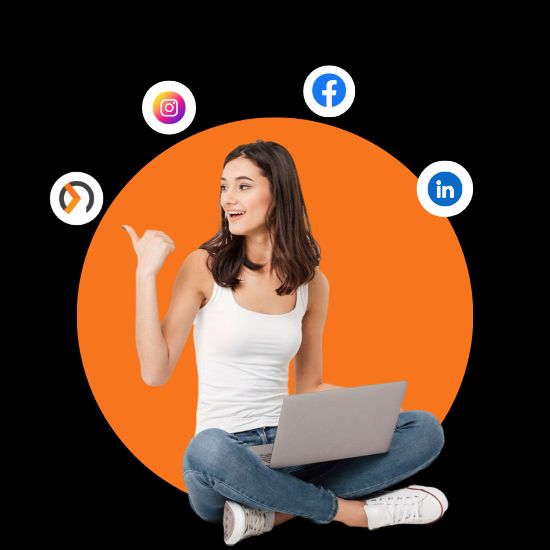 Young woman with a laptop pointing towards social media icons (Instagram, Facebook, LinkedIn) on an orange circle background, symbolizing digital marketing engagement.